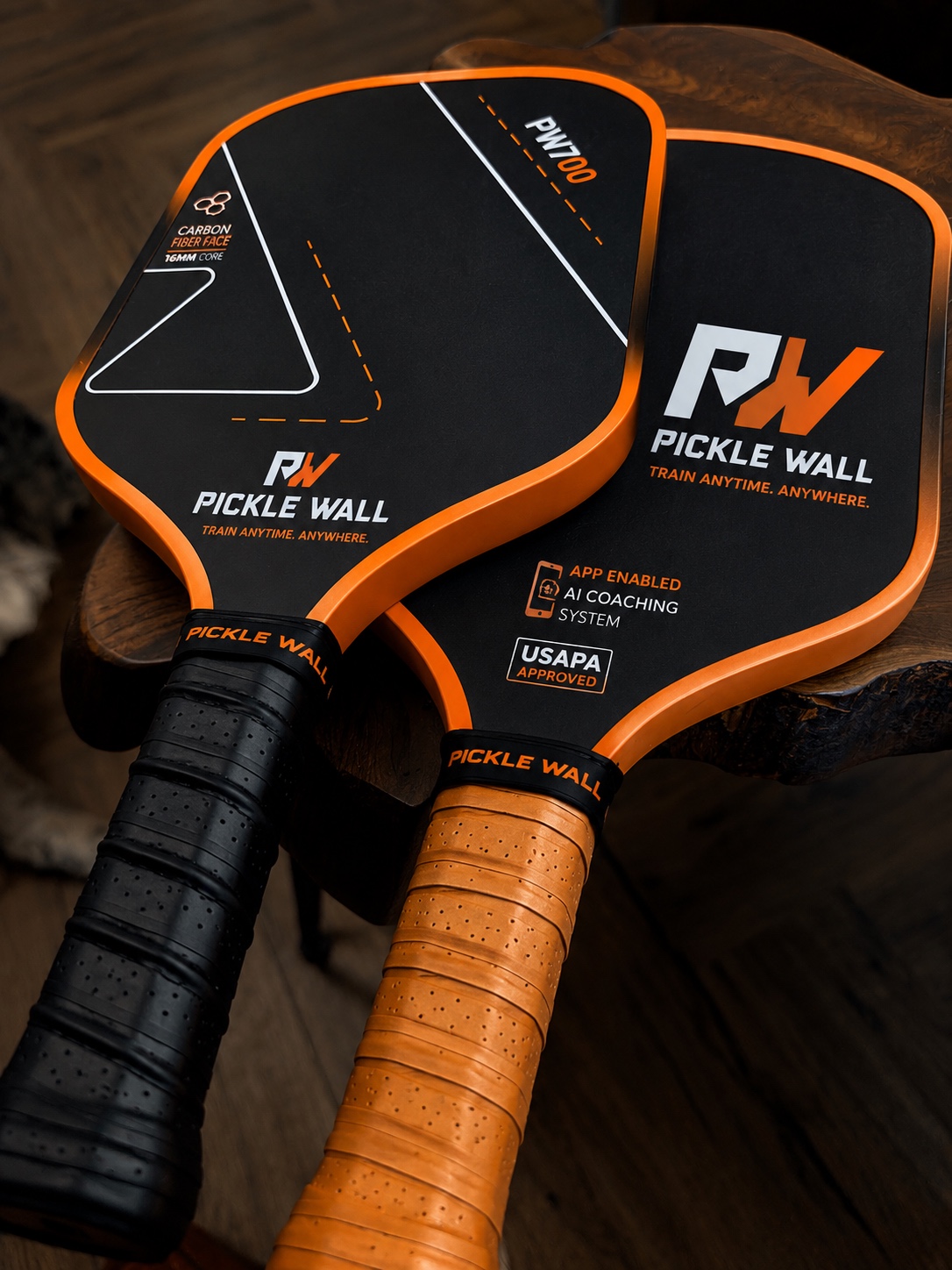Two Pickle Wall PW700 paddles with carbon fiber faces and app-enabled AI coaching